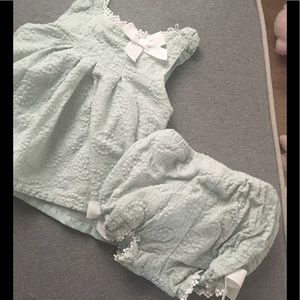 Adorable light green dress with romper bottom.